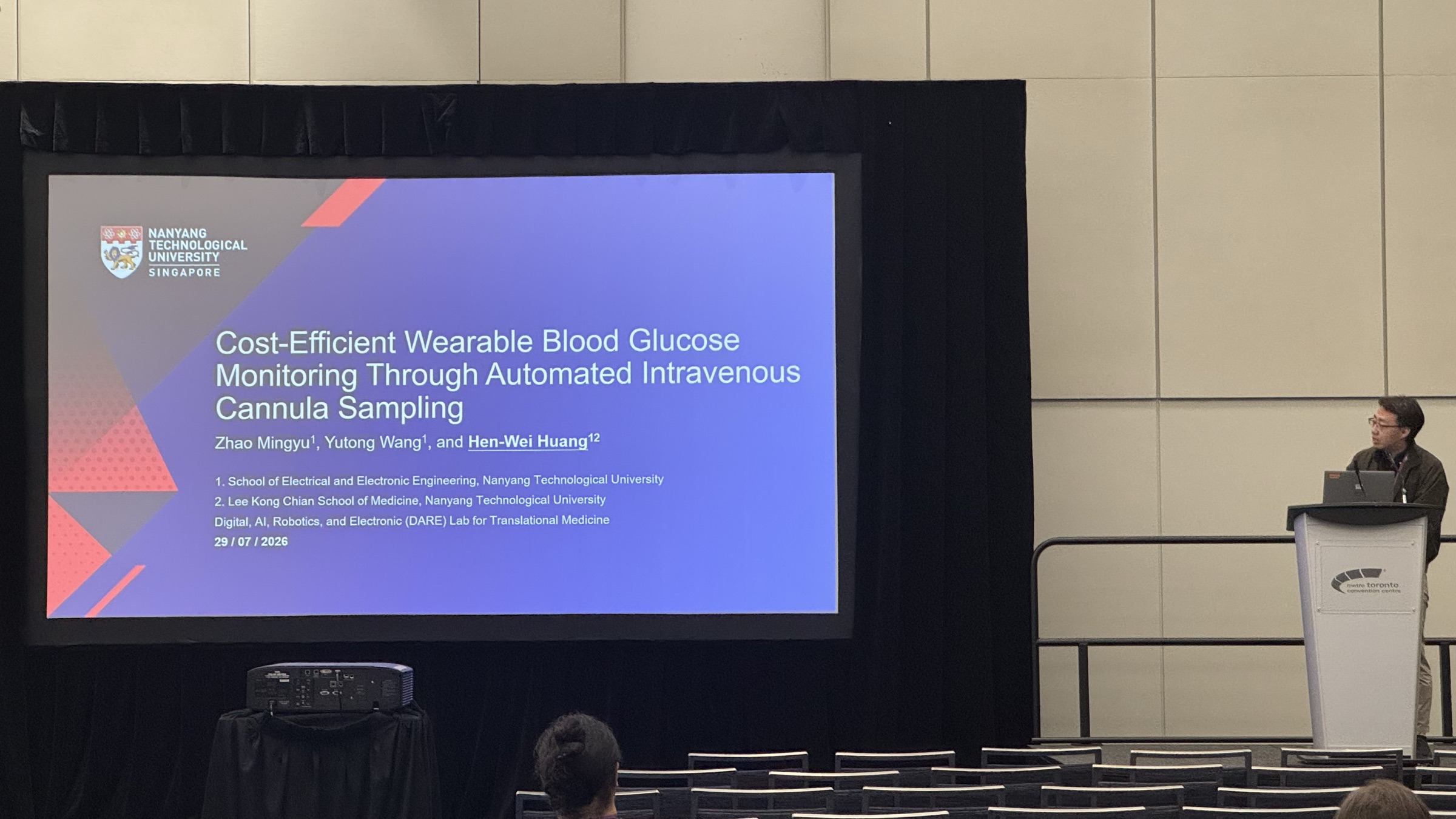 Prof. Hen-Wei Huang presenting at IEEE EMBC 2026